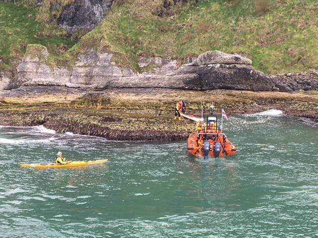 Red Bay RNLI this afternoon were called out to three canoeists stranded on rocks at Ballycastle