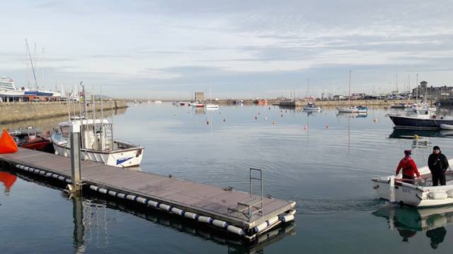 Competitors were greeted with a mirror-like seascape inside Dun Laoghaire harbour 