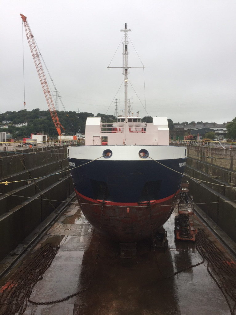 In this file photo is the occasion of the Irish flagged container/general cargoship M.V. Huelin Dispatch which is seen in the graving dry-dock at Cork Dockyard in 2017. The vessel since returned on 13th May for routine inspection and as of yesterday departed Ireland's sole dry-dock for ships and remains this evening at anchor offshore of Cork Harbour awaiting orders for the next charter. 