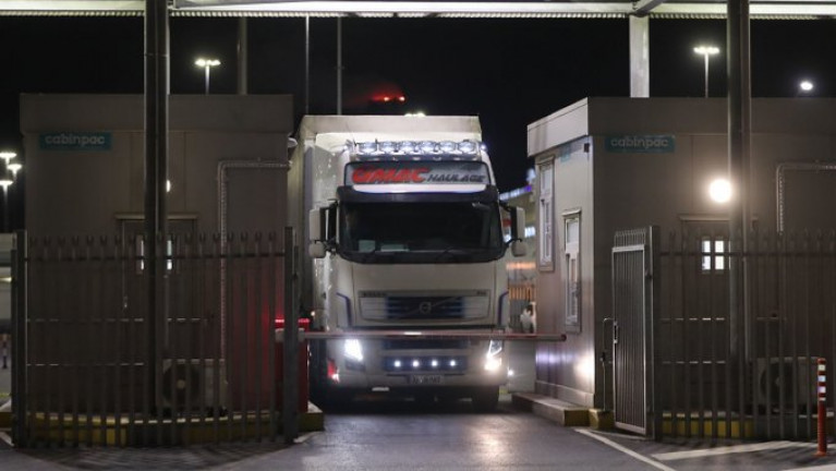 Revenue warns hauliers will face sanctions if directions to visit customs posts are ignored. Above: Trucks pass through a customs post at Dublin Port as new arrangements come into force (following a post-Brexit UK).