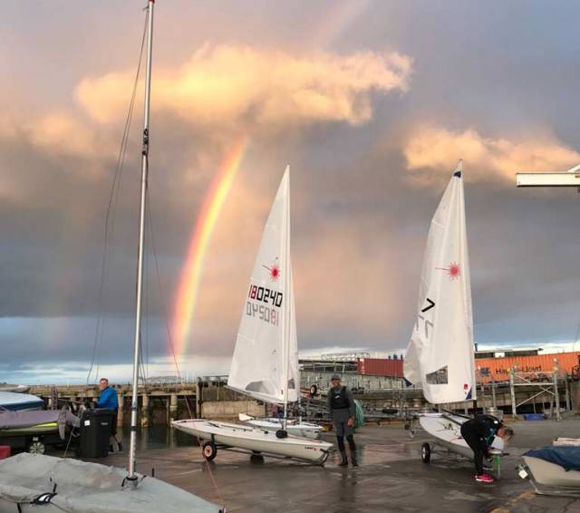 A rainbow appears on Dublin Bay as Laser sailors come ashore at the RStGYC in Dun Laoghaire