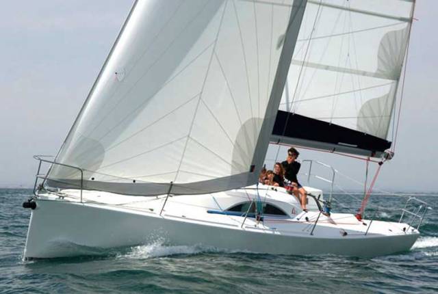 An Archambault A 35 as you’ll have seldom seen her - kitted out for the easiest of handling, and with a family crew out for a sunny day sail.
