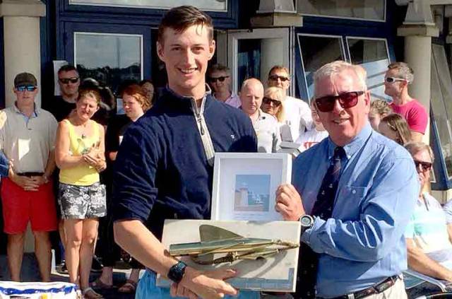 Ewan McMahon (left) winner of the Laser Standard Rig division at the Leinster Championships at Howth Yacht Club from Vice Commodore Ian Byrne