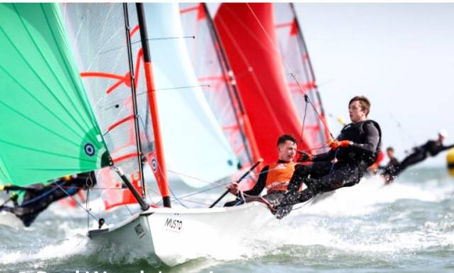 Royal Cork's Harry Durcan and Harry Whitaker with green spinnaker in a downwind leg at the 29er British Youth Nationals