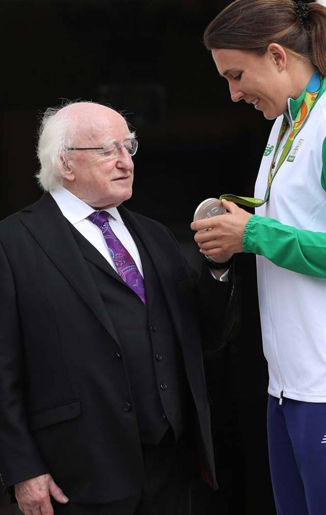 President Michael D Higgins congratulates Annalise Murphy on her Olympic Silver medal