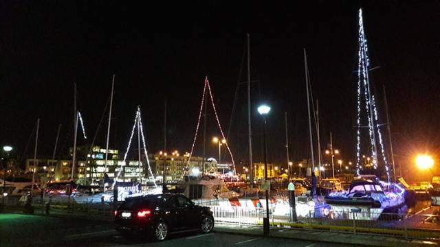 ’Tis the season to be jolly – and ahead of the game. The festive lights on the marina boats in Galway Dock are starting to become competitive