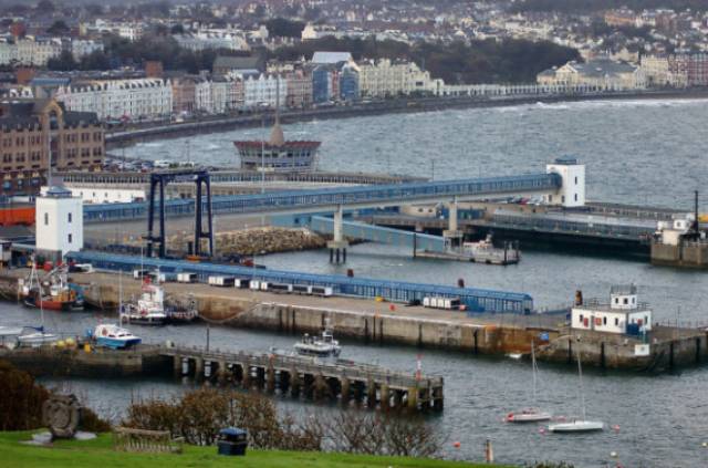 A close up view of Douglas Harbour's ferry terminal and visible (on the left), one of two ro-ro ramp linkspans and associated covered passenger walkways.  