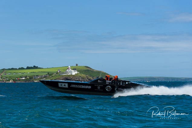 all black cork powerboat. roches point