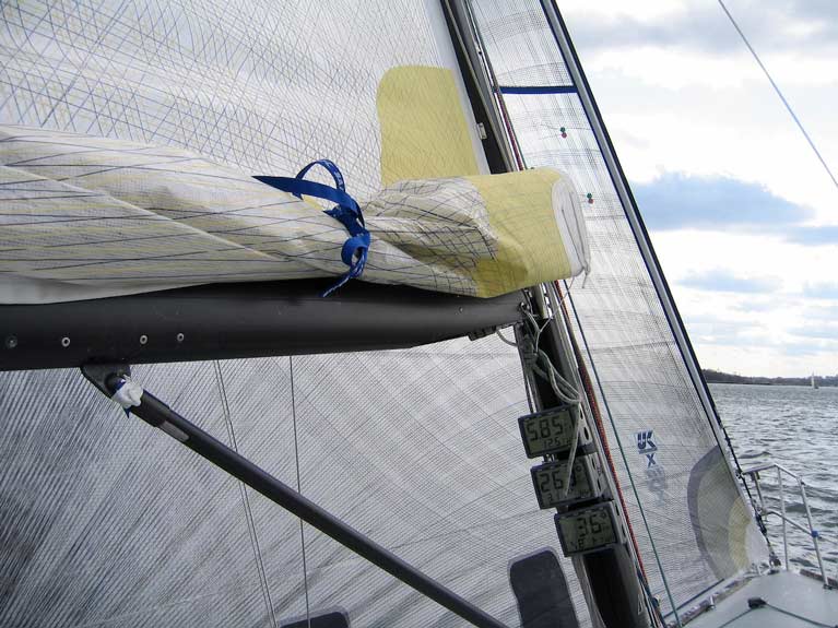 A reefed mainsail tied
