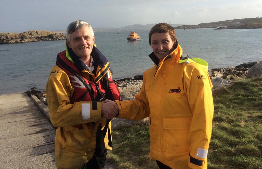 Coxswain Jimmy Early with station president Majella O'Donnell
