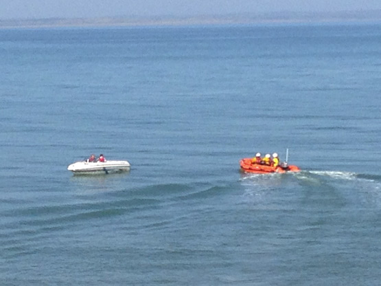 Newcastle RNLI volunteers launching the Inshore Lifeboat