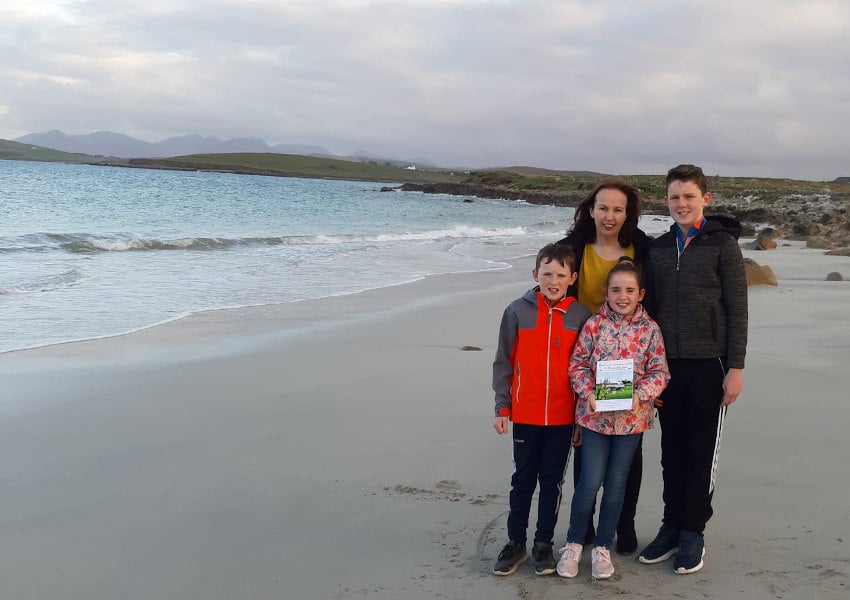 Author Marie Feeney with her children Ronan, Diarmuid and Michaela at Sallerna Beach in Cleggan, Co Galway (Photo: Marie Feeney)