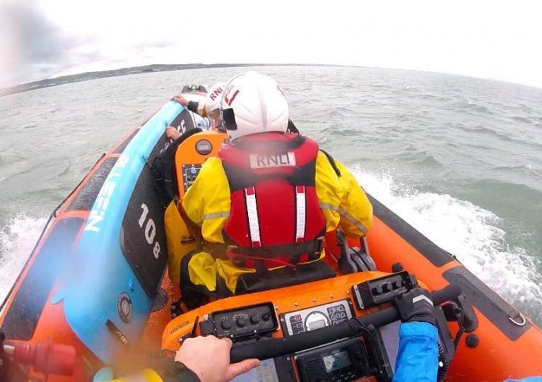 Skerries RNLI returning to station with the paddle boarders on board