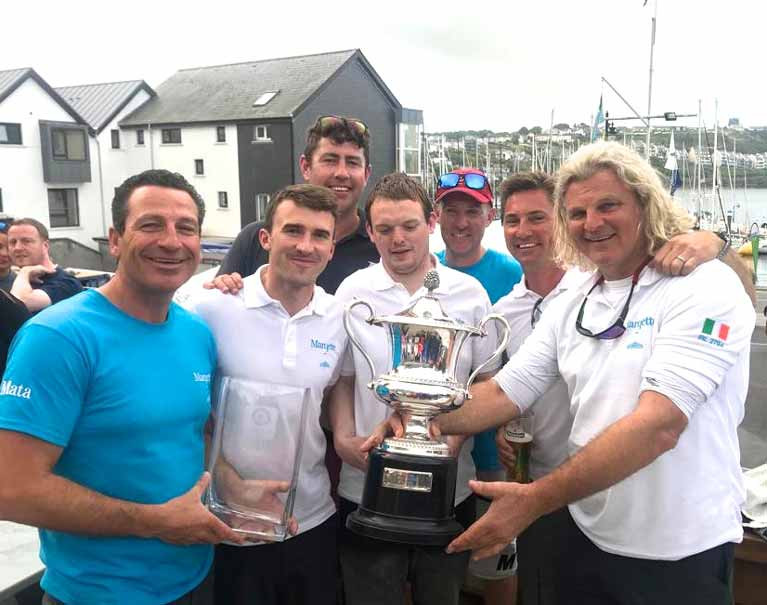 Darren Wright (left) with the crew of Mata and the Irish Half Ton Trophy in Kinsale with co-owners Michael Wright (right) and Rick De Neve (second right)