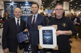Glen Wallis, Business Development Manager at GJW Direct presents Gavin Deane and Mark Ring of Royal Cork Yacht Club with Marina of the Year runner up prize for International Marina of the Year 2017 at The Yacht Harbour Association, Marina of the Year Awards 2017 at the London Boat Show 2017, Excel, London