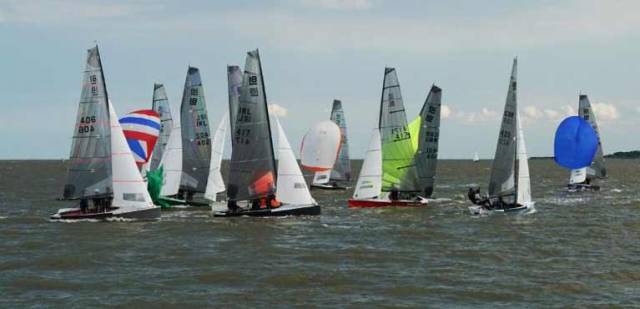 Action at the leeward mark, Shark Eleven leads from Second Wife