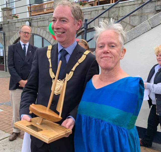 Dun Laoghaire Rathdown Cathaoirleach Shay Brennan presents the 'Spirit of Sailability' trophy to Mary Duffy for her 'determination and sportsmanship competing solo in very challenging conditions'
