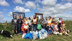 A County Cork Community cleaning-up at Ballynamona Beach