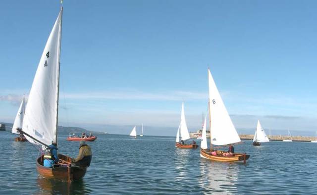 28 Water Wags turned up for the race for the J.B. Stephens tankard in Dun Laoghaire Harbour. A 6-knot wind was blowing from the northeast, and the last hour of the flood tide was flowing into the harbour.