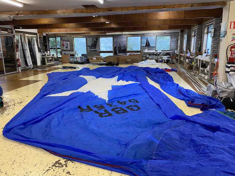 The sail loft at UK Sailmakers Ireland at Crosshaven in County Cork with a spinnaker repair underway