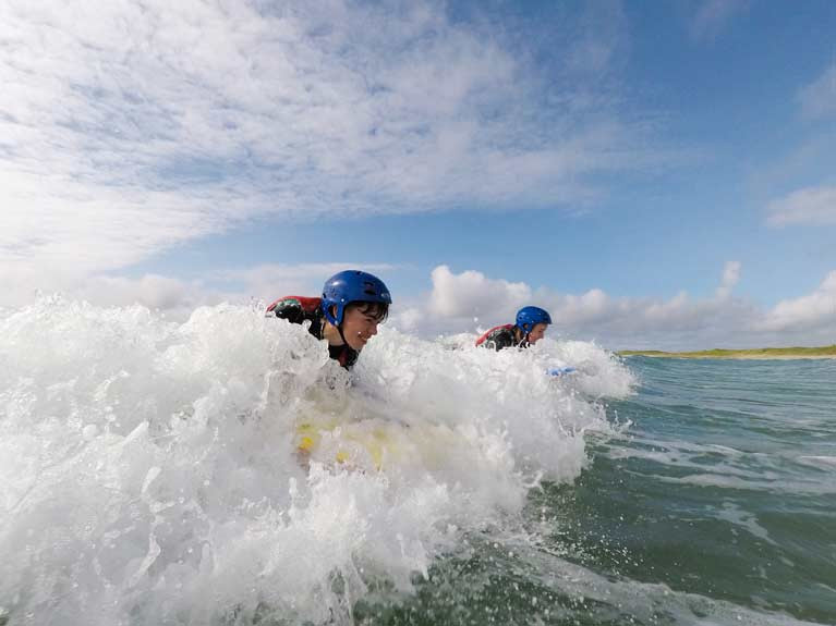 Surfing at Colaiste Uisce in County Mayo