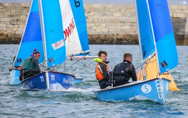 Defending champions Micheál O' Sullivan and Mikey Carroll lead a race at the 2018 All Ireland Junior sailing championships raced inside Dun Laoghaire Harbour