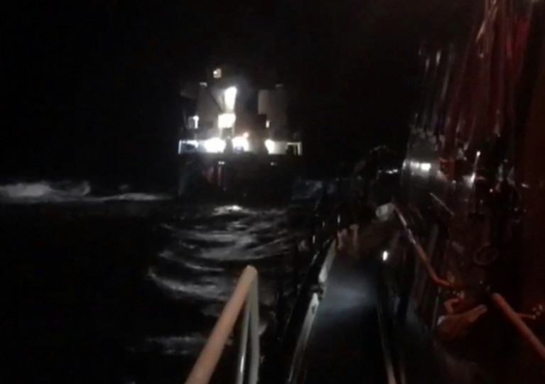 Portree lifeboat approaches the grounded cargo ship MV Kaami