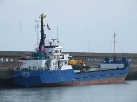 The Belize City registered Burhou I having discharged round timber (logs) from Scotland, was detained in Wicklow Port and is seen at the harbour&#039;s East Pier on St. Patrick&#039;s Day