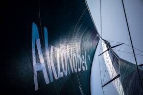 Team AkzoNobel’s Nicolai Sehested climbs the rig to make checks and look for wind