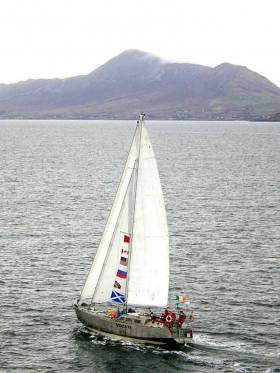 Northabout returns from her Arctic circumnavigation to her home port of Clew Bay in Mayo with a welcome from the holy mountain of Croagh Patrick
