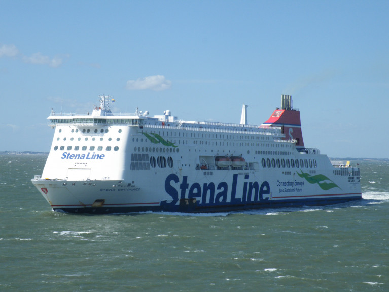 Quarantine restrictions in the UK were lifted (yesterday, 2 Aug.) for fully-vaccinated EU and US passengers. Above AFLOAT's photo of Stena Britannia, (outward bound off Harwich), is one of pair of giant 63,500gt ferries that operates Stena Line's only 'combined passenger & freight' route connecting the UK and mainland Europe through the Dutch port of Hook van Holland. The North Sea route also acts as a UK 'landbridge' for trade travelling between Ireland and Europe and beyond, where in Scandinavia and the Baltic Sea, Stena operate a more larger route network. 