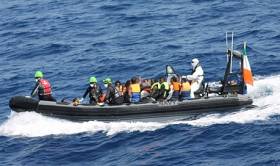 A rigid inflatable boat (RIB) from LE Samuel Beckett with rescued migrants on board 