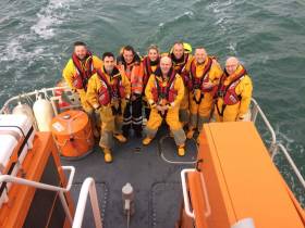 Comedian PJ Gallagher with Dun Laoghaire RNLI volunteers