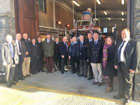 Sir Tim Laurence and fellow RNLI officials with Bangor lifeboat station volunteers