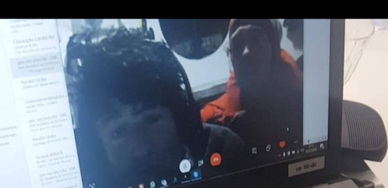 A screen shot of video from onboard Jean Le Cam's yacht showing the two sailors safe after the rescue mission