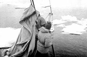H.W. ‘Bill’ Tilman among loose floes on Mischief in Greenland