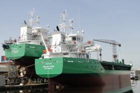 Newbuild sisters Arklow Villa the final of 10 ships for ASN sits high and dry at a Dutch yard&#039;s fit-out quay where berthed alongside is Arklow Viking which began sea trails yesterday. 