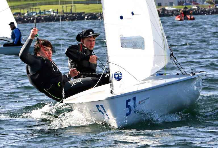 Ben Graf on helm and Alexander Farrell on wire as they shape their champion International 420 for a start