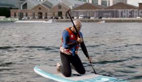 Bobby Kerr tries paddle boarding at Grand Canal Dock in the first episode of UTV Ireland’s Along Home Shores