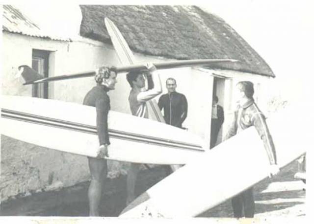 Kevin Cavey (right) in Sligo in 1967 with one of Ireland's first fibreglass surfboards