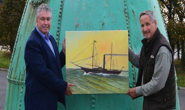 Drogheda artist Raymond Balfe (right) has brought the famous paddle steamer ‘Town of Drogheda’ back to life in an oil painting to commemorate the vessel's 190th anniversary. Pictured left is Paul Fleming DPC CEO