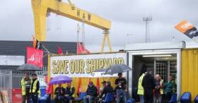 Employees of Harland and Wolff during their protest at the gates of the shipyard in Belfast