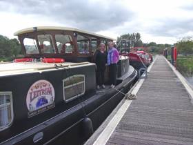 Mary McInerney with Waterways Ireland’s Sinead Mallon on the ‘boatel’ Lovely Leitrim in Enniskillen this week