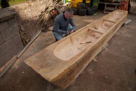 Master craftsman Mark Griffiths working on full scale replica of 2,400 year old logboat found on Connemara&#039;s lough Corrib