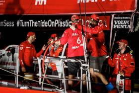 The MAPFRE crew begin to relax on deck after a gruelling Leg 7