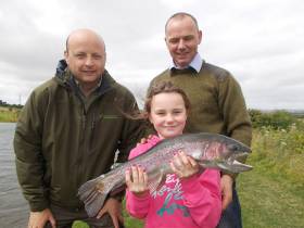 Alana Kerr (Age 9) of Dunmoe, Co.Meath, Brendan Kerr and Oisin Cahill of Inland Fisheries Ireland enjoying a fishing trip along with the Boyne Valley Fishing Hub at Courtlough Trout Fishery. The fishing trip was organised by the Dublin Angling Initiative