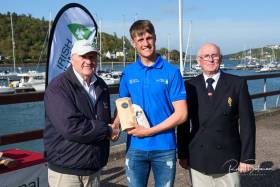 Irish Sailing President Jack Roy (left) with Radial winner Jamie McMahon and RCYC Admiral Pat Farnan. Scroll down for gallery of prizegiving photos
