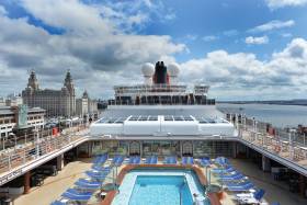 Cunard Line&#039;s &#039;Vista&#039; class Queen Elizabeth alongside Liverpool Cruise Terminal. The call was to celebrate the centenary of the former Cunard Line building, one of the &#039;Three Graces&#039; on the famous Mersey waterfront