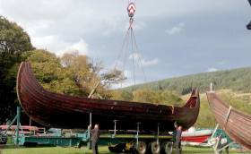 A 50–foot Viking longboat is lifted off a trailer in advance of filming on Lough Dann in County Wicklow for the Viking TV series. Plans are afoot to locate one of the Norse boats at Dun Laoghaire Harbour