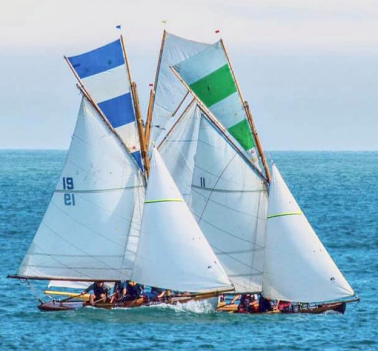 “Every summer Saturday is Regatta Day” The Howth 17s Isobel (Turvey brothers) and Deiliginis (Massey, Twomey &amp; Kenny) demonstrating their Saturday style. They try to maximize crew numbers, and thus have declined involvement in today’s Two-Hander at Howth.